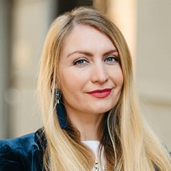 Elena Semenchuck PCC headshot photo, blond woman smiling outside