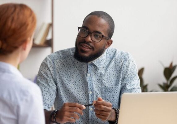 coach ready to learn with a beginners mindset in conversation with another coach