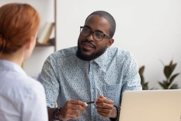 coach ready to learn with a beginners mindset in conversation with another coach